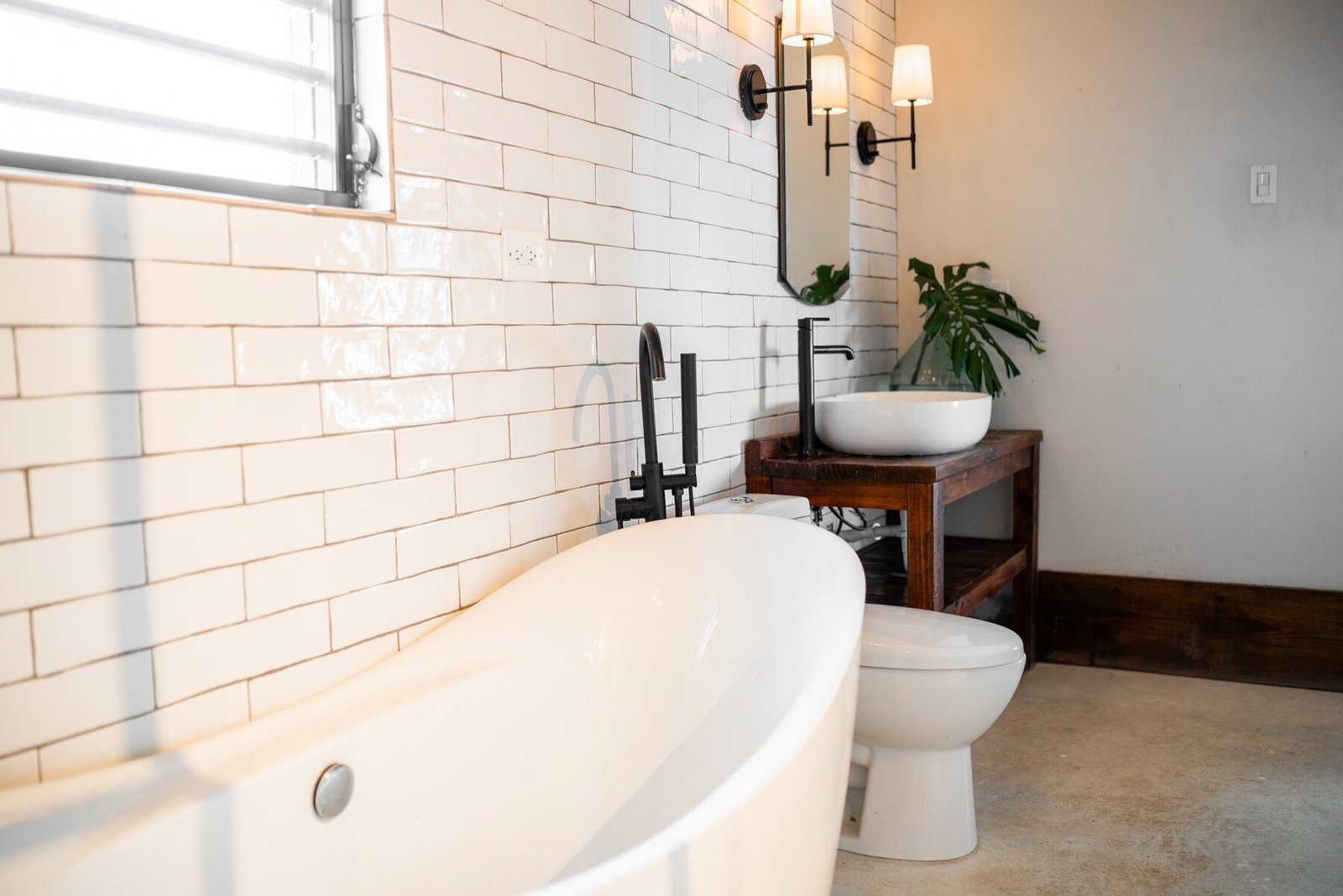 Penthouse bathroom with soaking tub and vessel sink