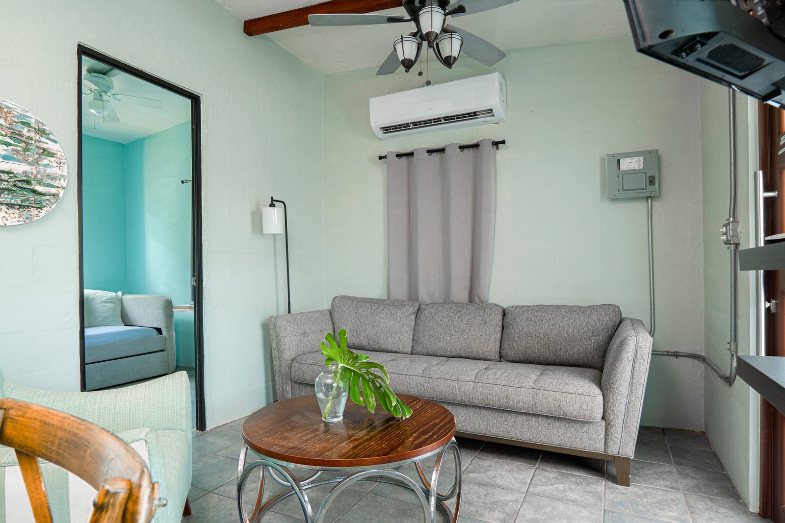 Living room with view into the daybed room