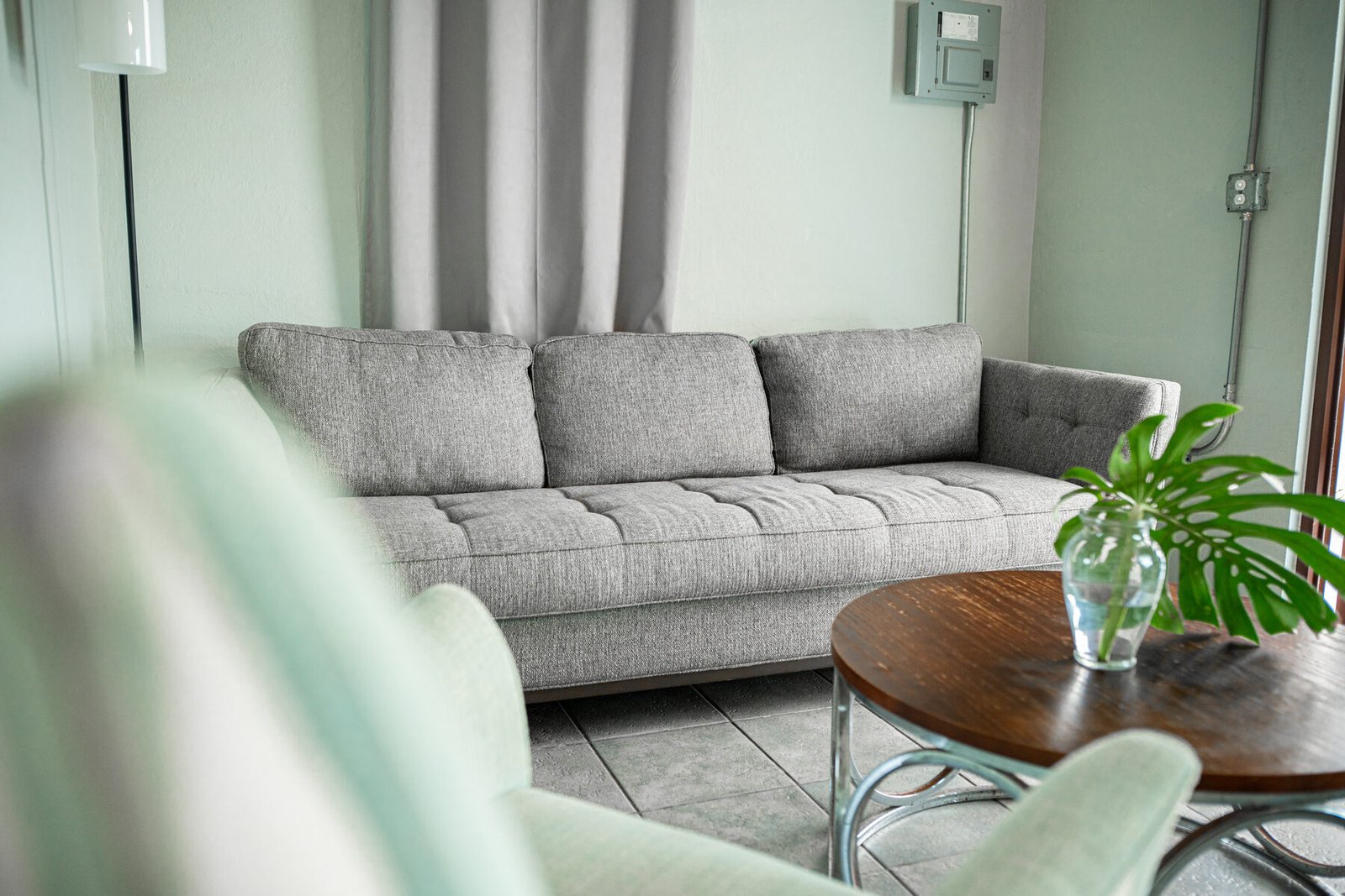 Gray sofa and coffee table detail