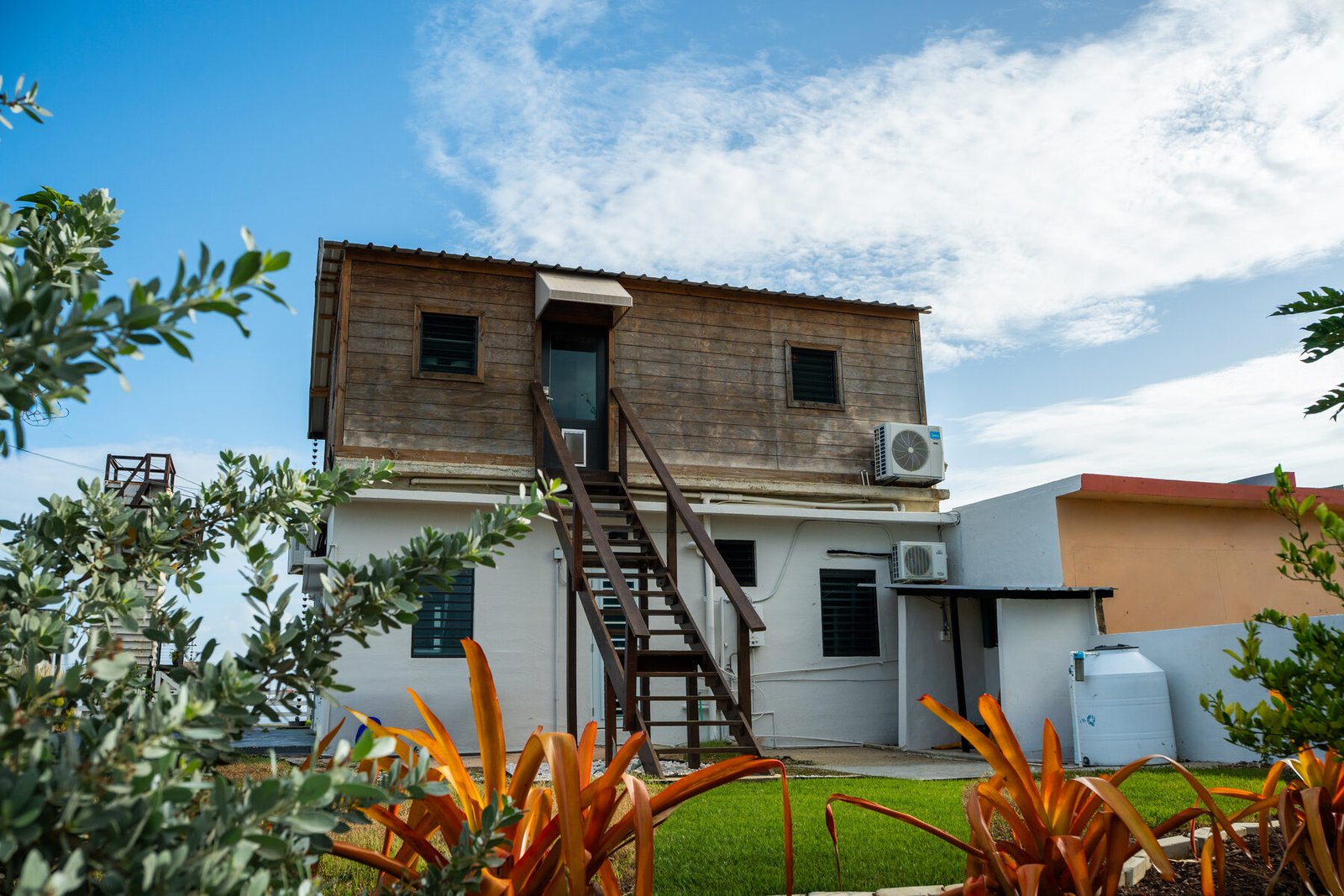 Aerial view of the balcony, hammock porch, and driveway