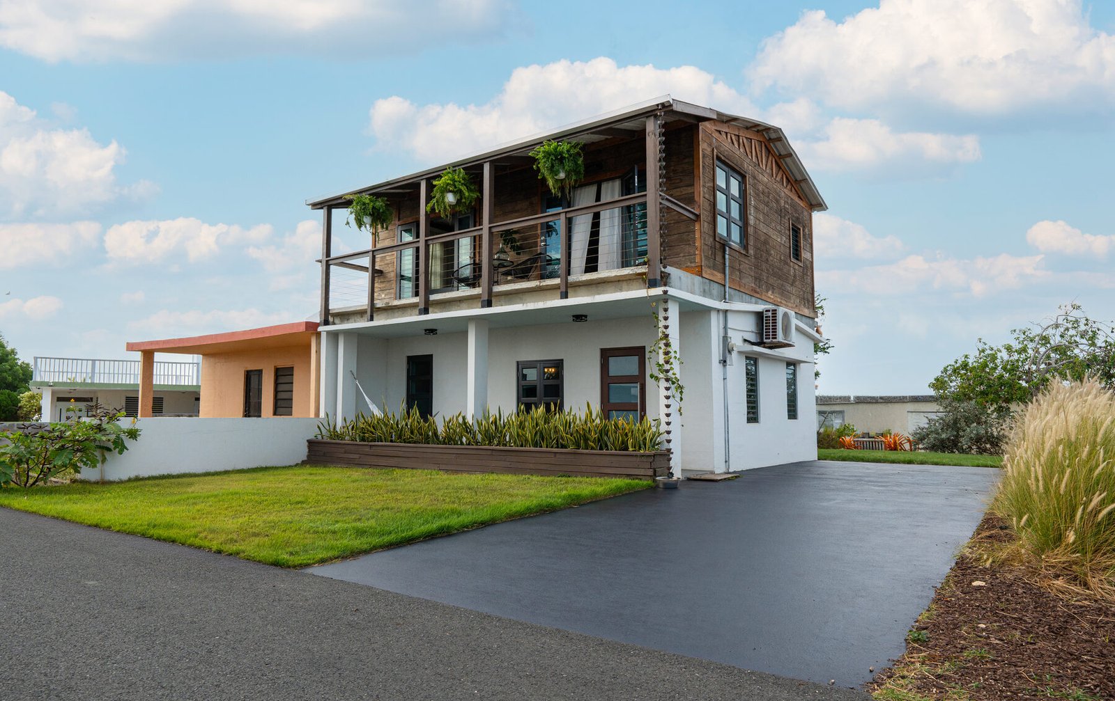 Rear exterior with exterior stairs to the Penthouse