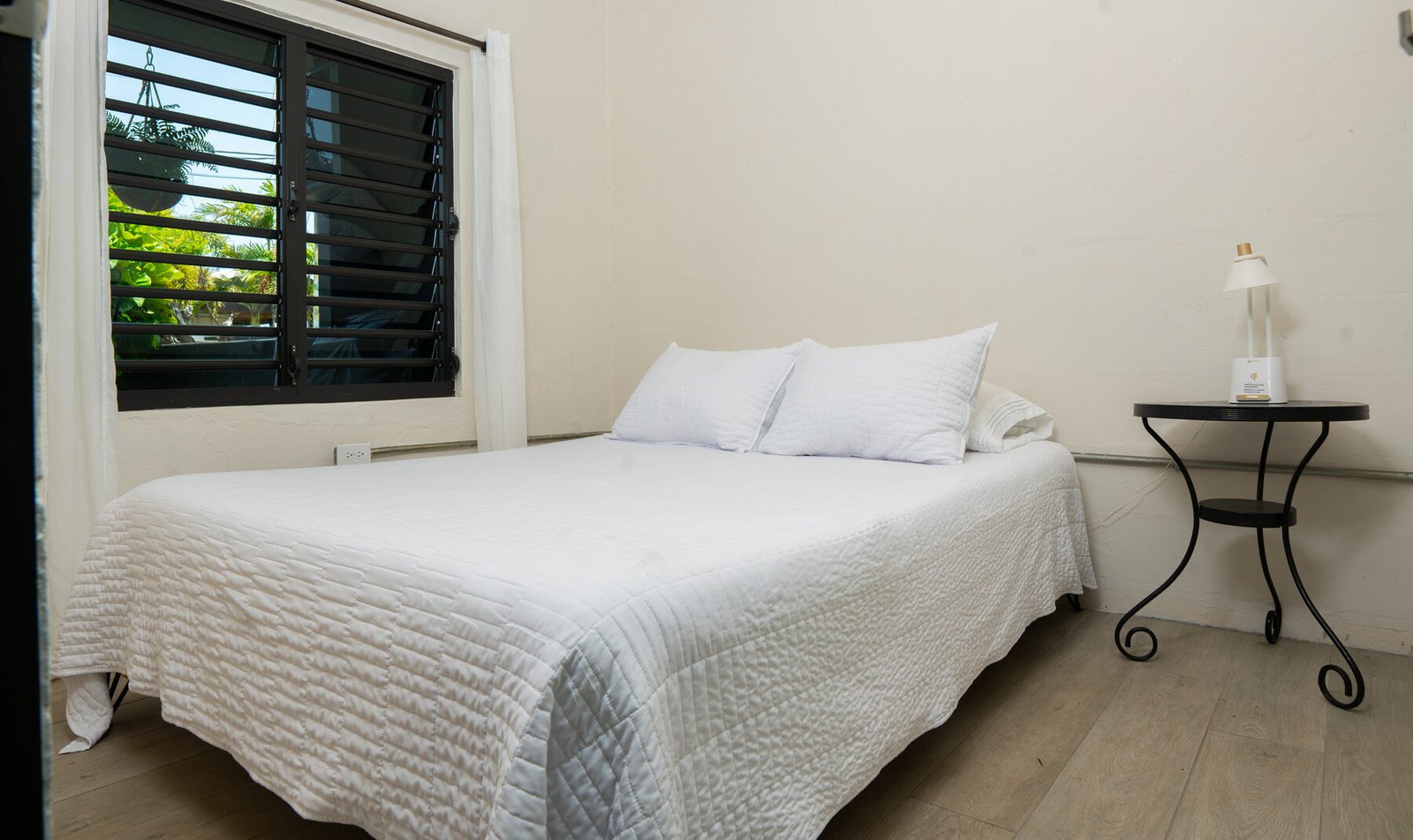 Bedroom pillow and nightstand detail