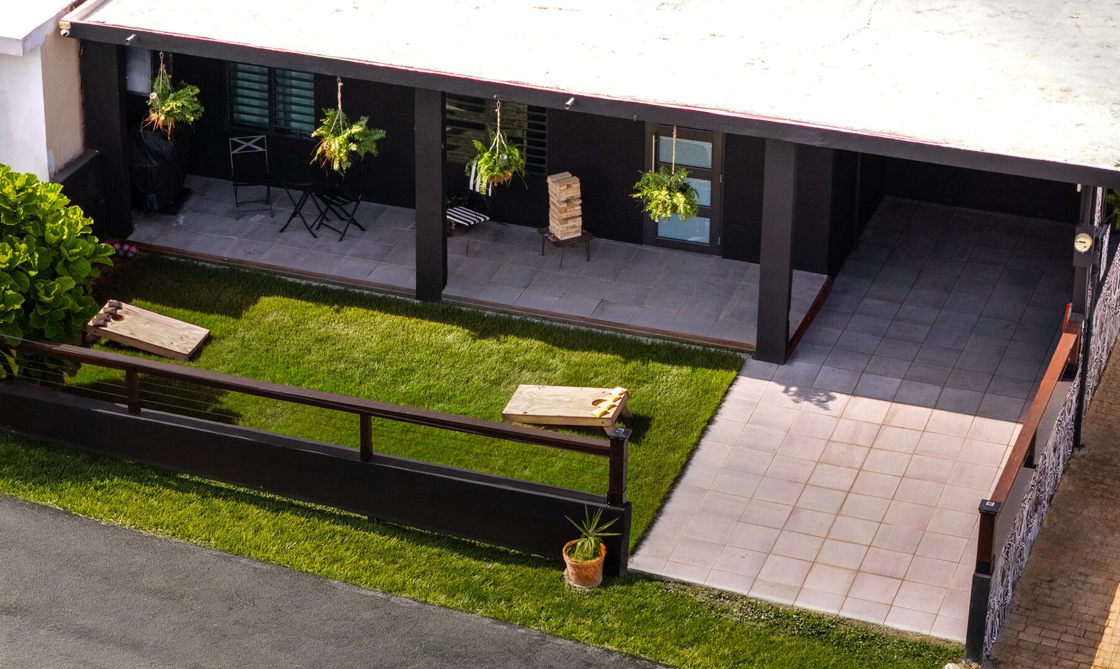 Aerial view of Casita Negra's covered porch and lawn