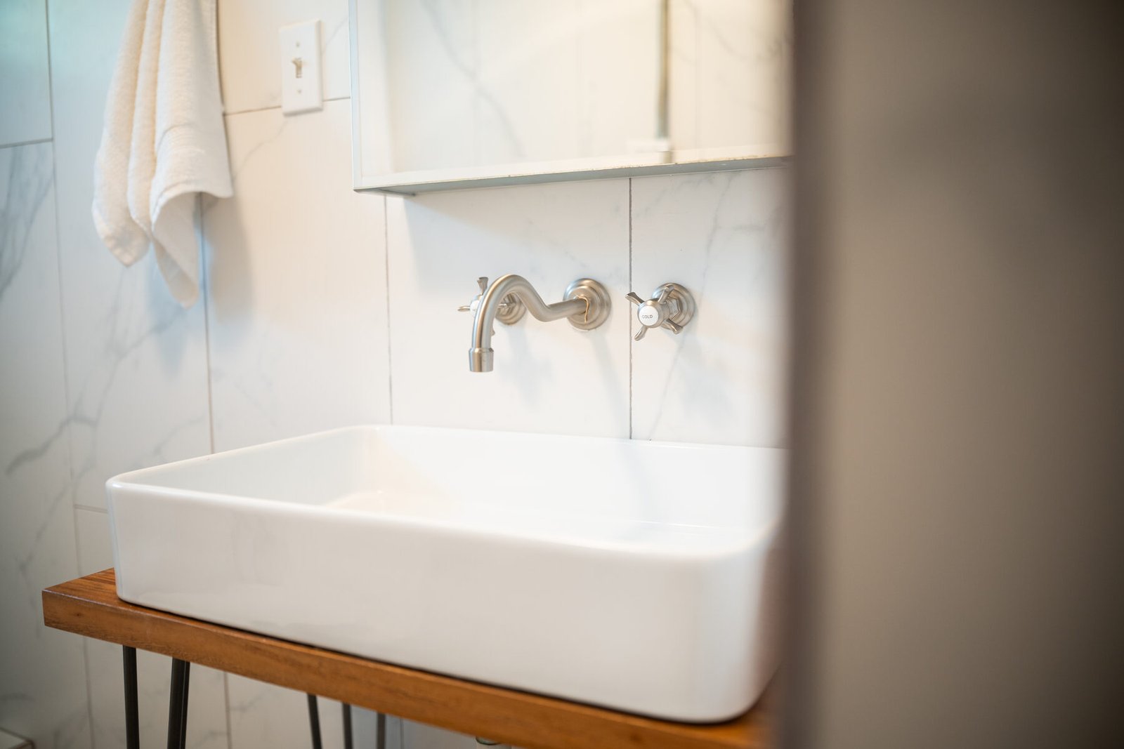 Hallway console with rolled towels