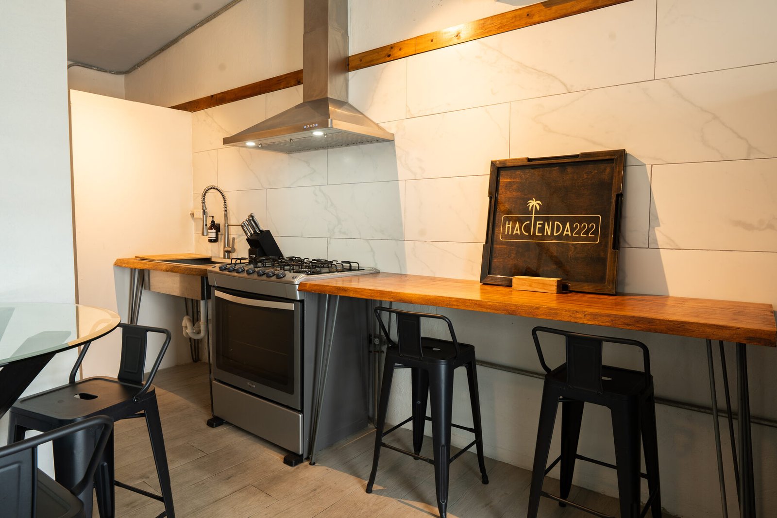 Kitchen range hood and Hacienda 222 sign detail