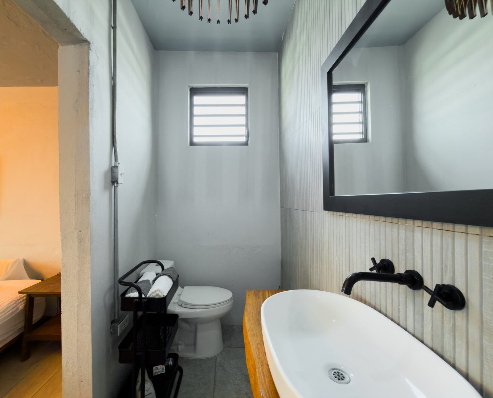 Bathroom with toilet and vessel sink